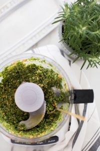pesto with fork and plant