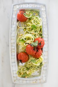 platted noodles with tomatoes