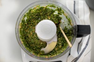 pesto with spoon in it
