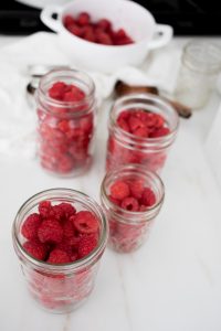 raspberries in jars