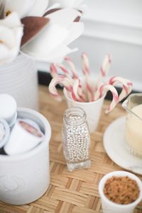 candy canes in cup and edible silver balls