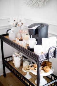 black bar cart, stacked mugs keurig coffee machine