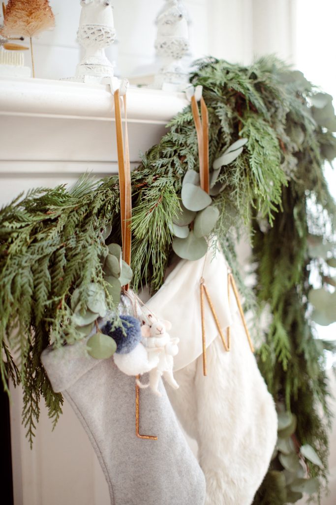 detail of hung stocking and natural green garland
