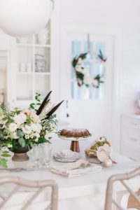 island with christmas floral arrangement and bundt cake