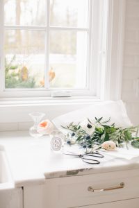 kitchen counter, window florals and vases