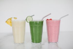 front shot of three different smoothies