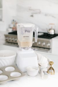 white blender, ingredients in white kitchen