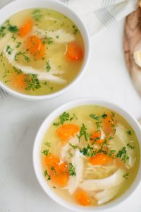 two bowls of chicken noodle soup