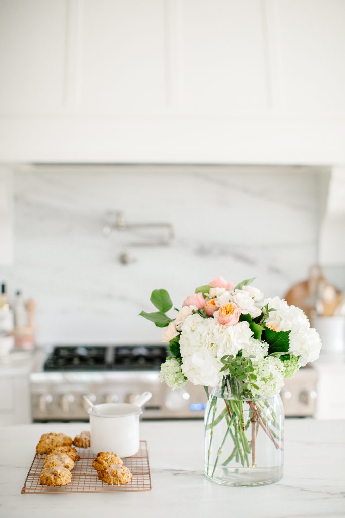 florals and scones in bright white kitchen