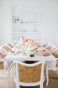 white dinning room set with ombre floral on table