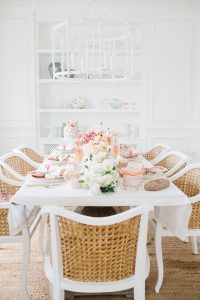 Dinning room set with beautiful table and florals