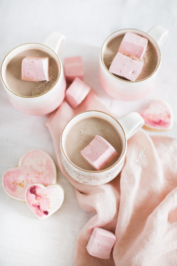 hot chocolate with marshmallows and heart cookies