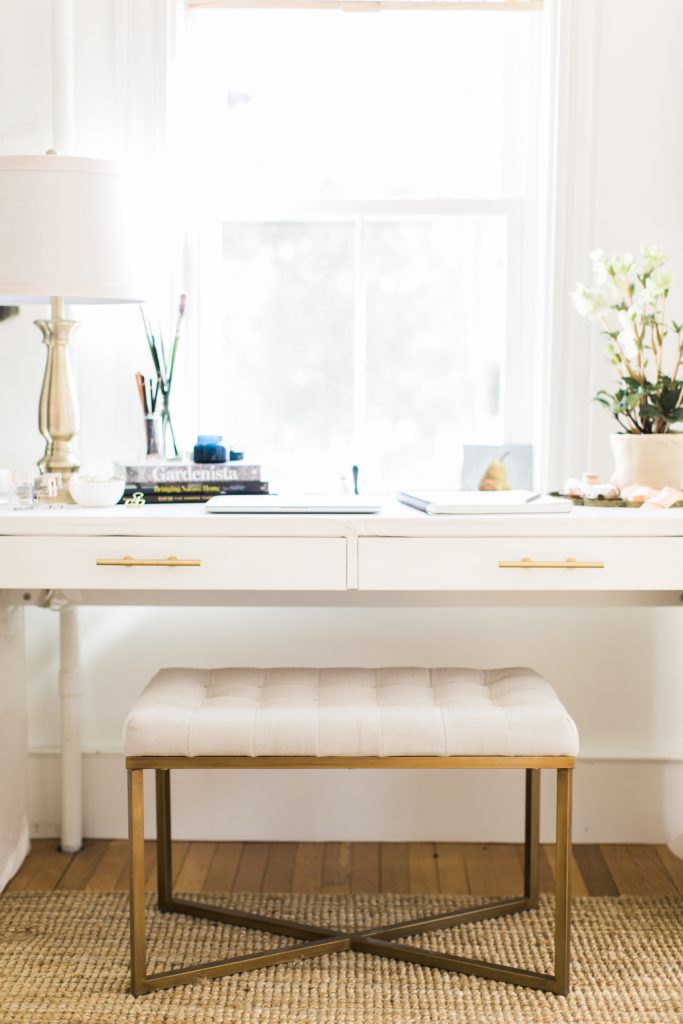 White desk with gold bench