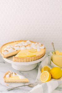 Lemon meringue tart on cake stand