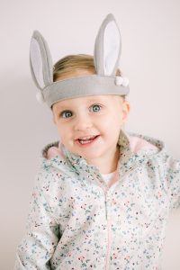 little girl with bunny ear headband