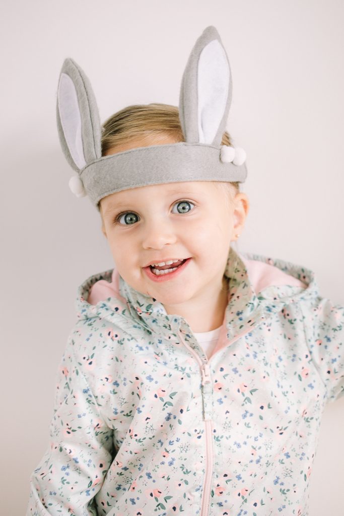 little girl with bunny ear headband