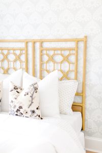 layered pillows whites and floral pattern