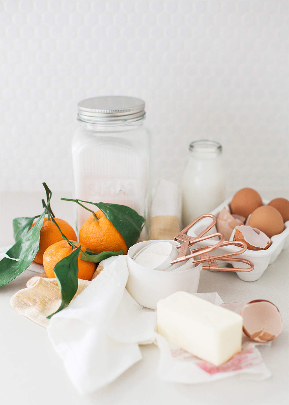 ingredients for a cake with fresh oranges