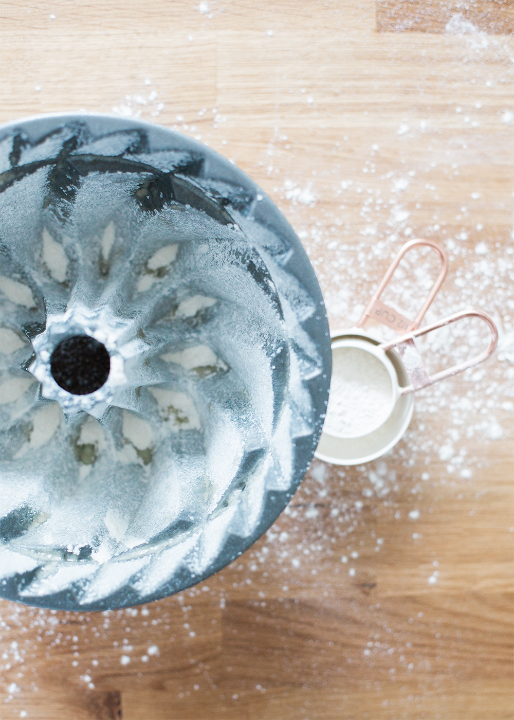 bundt cake mold dusted with flower