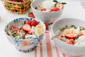 pretty oats in a bowl with floral garnish