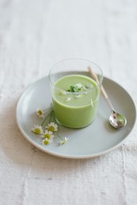 green panna cotta with daisies