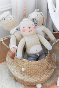 pom pom basket with stuffed animals