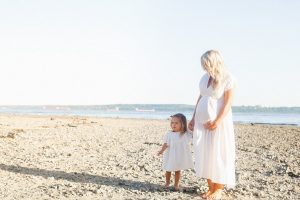 girl and mom on beach