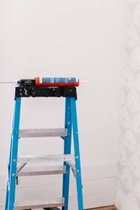 ladder with caulking on top
