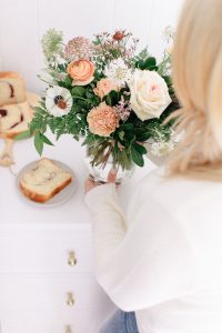 placing florals on table