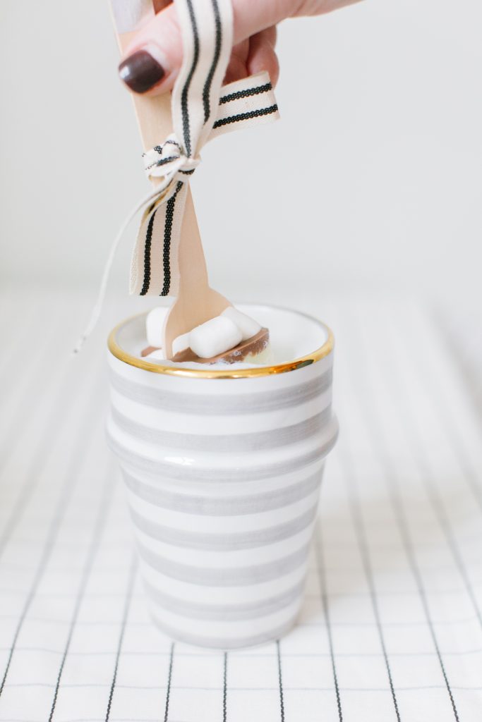 cocoa spoon dipped in cup