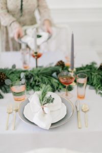 Christmas place setting with copper and pine