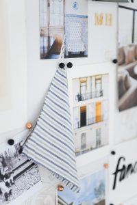 Inspiration Board with brass pins, images and stripe cloth