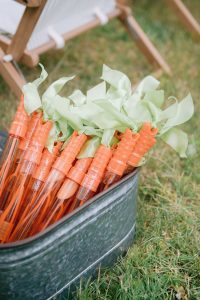 orange bubble wand with green ribbon carrot