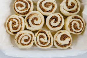 cinnamon buns in baker