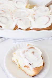Piece of cinnamon bun with icing on top