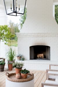 white brick outdoor fireplace