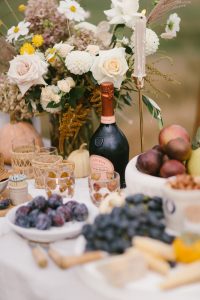 Sparkling Apple juice and fruit with flowers