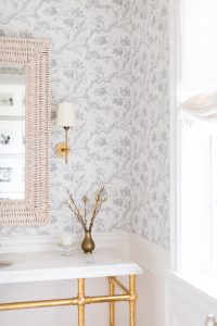 Wicker Mirror with Gold Sconce and Toile De Fleurs Wallpaper Off Set