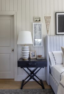 Styled bedside table with lamp and frame