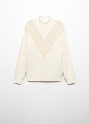 Knitted sweater with openwork details